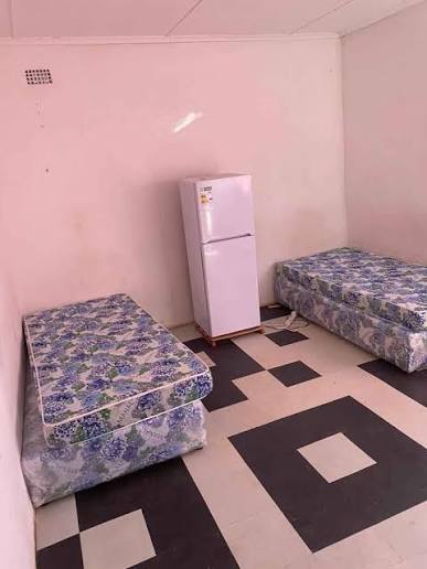 Why is there no strict regulation for boarding houses in Lusaka?